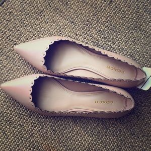 Coach flats with stud details!